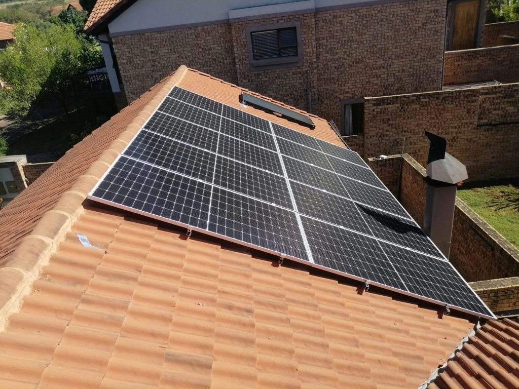 Solar panels installed on a tiled residential roof.
